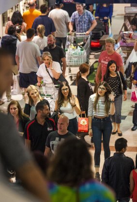 Last-minute Christmas shoppers at Highpoint late on Tuesday night.