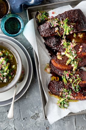 Coffee-rubbed brisket with charred herb salsa.