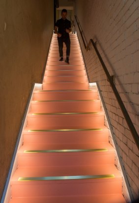 Cheek's Millenial pink and gold staircase.