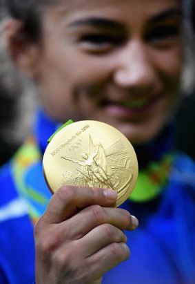 Making history: Gold medalist Majlinda Kelmendi from Kosovo.