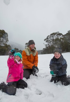 The Beaumont family enjoying snow at Thredbo on Monday.