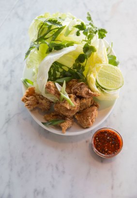 The Korean Fried Chicken comes with iceberg lettuce, spring onion and chilli.