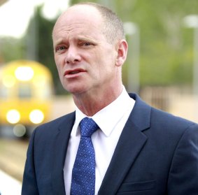 Premier Campbell Newman prepares for a tight election.