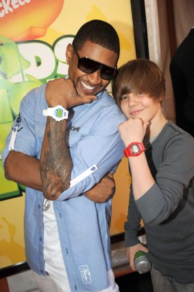 Justin Bieber with Usher at Nickelodeon's 2009 Kids' Choice Awards in 2009. 