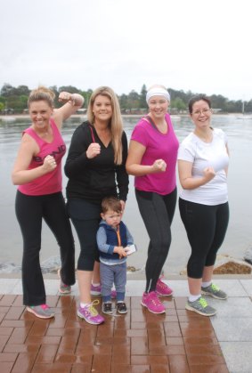 The Coastie Chicks competing in the Miss Muddy event in Canberra (l-r) Kasis Currall, Karen Van Der Stelt and son Lucas, Ashley Frigo and Marisol Dunham.