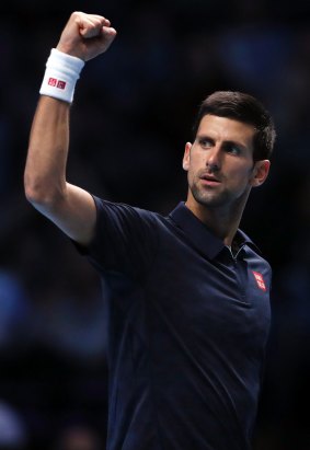 Novak Djokovic celebrates after defeating Kei Nishikori.