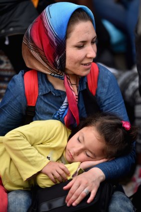 A woman and child are among the hundreds of migrants trying to travel north in Croatia.