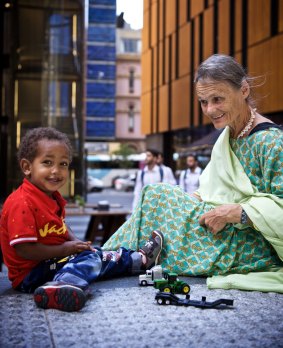Australian nurse Valerie Browning in Sydney this week with her two-year-old adopted son Nabil.