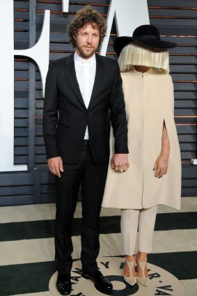 Erik Anders Lang and Sia attend the 2015 Vanity Fair Oscar Party in 2015.