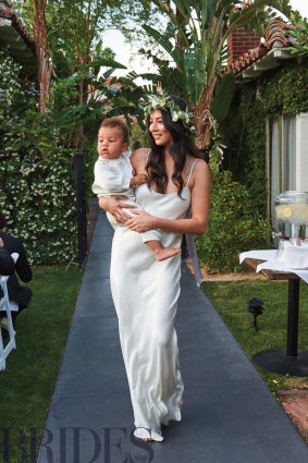 Jessica Gomes had the honour of carrying the best little man, Zion, the pair's chubby cheeked son, down the aisle.