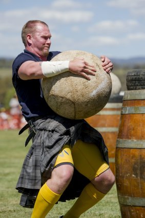 Moe Westmoreland  in the Stones of Manhood event at the Canberra Highland Gathering and Scottish Fair in Kambah. 