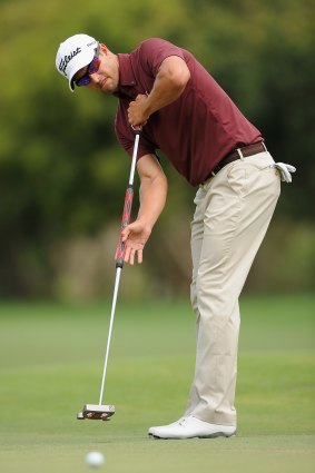 Adam Scott with the anchored putter.