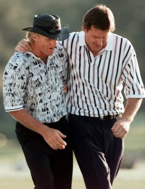 England's Nick Faldo, right, and Australia's Greg Norman walk off the 18th after Faldo won his third Masters in 1996.