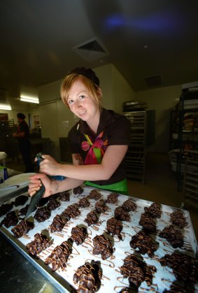 Danni Smyth places finishing touches on Yarra Valley Chocolaterie chocolates. 