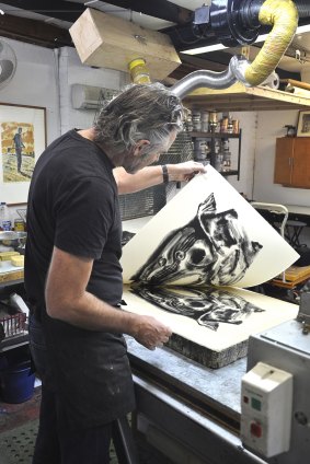 Lithographer Peter Lancaster prints Under Wraps by Jim Pavlidis.