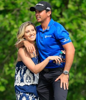 Well done: Ellie Day hugs Jason after he won his match against Brooks Koepka.
