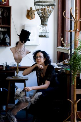 Animal lover: Julia deVille in her studio with her (real) dog Scout.