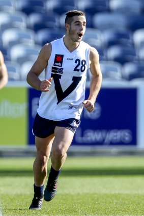 Vic Country midfielder Myles Poholke celebrates a goal against Vic Metro