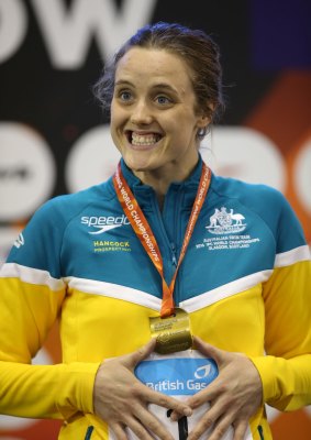 Ellie Cole with her gold medal from the Women's 100m Backstroke S9 during Day One of The IPC Swimming World Championships in Glasgow.