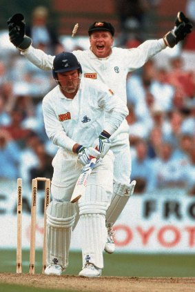 Australian wicketkeeper Ian Healy celebrates as England's Mike Gatting is bowled by Shane Warne in Manchester during Australia's Ashes tour of England in 1993. The ball was Warne's first in Test cricket in England and was later named "The Ball of the Century".