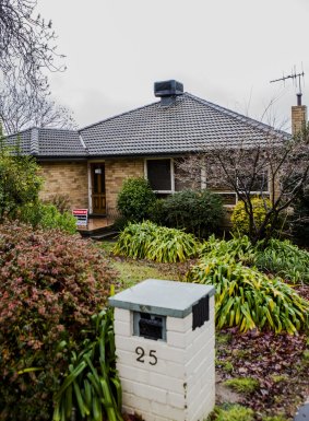 One of eight Fluffy houses in Julius Street, Pearce, is now vacant, with its letterbox taped up and waiting to be demolished.