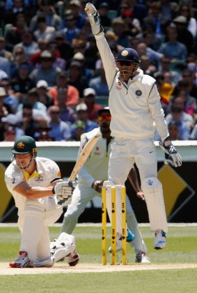 Another chance goes begging: Indian captain MS Dhoni appeals for the wicket of Shane Watson, who again fell short of a fifth Test century.