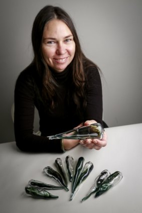 Artist Yhonnie Scarce with some of the glass yams made for her <i>Thunder Raining Poison </i>installation, which will be shown at the Tarnanthi Indigenous arts festival.