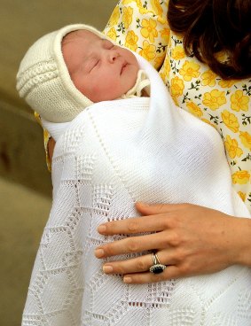 Catherine, Duchess of Cambridge holds her newborn daughter.