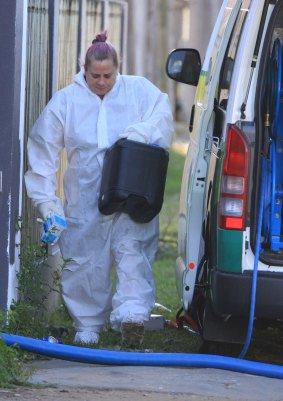 Professional cleaners clear the scene of a horrendous stabbing at Home Hill Hostel, near Townsville. Smail Ayad has been charged with murder and attempted murder over the death of British backpacker Mia Ayliffe-Chung and serious wounding of Thomas Jackson.