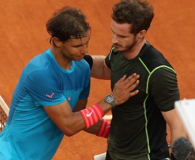 Andy Murray shakes hands with Nadal after his victory in the Madrid Masters. 
