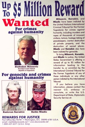 Wanted poster for Yugoslav President Slobodan Milosevic and Bosnian Serb leaders Radovan Karadzic and Ratko Mladic released by the US State Department in 2000.