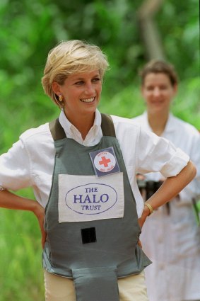 Diana, Princess Of Wales In Angola During A Visit To An Area Being Cleared Of Mines By The Halo Trust Wearing A Badge For The Red Cross Charity.