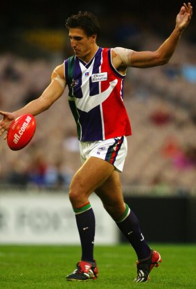 Pavlich made the second of his six All-Australian teams on a half-forward flank in 2003.