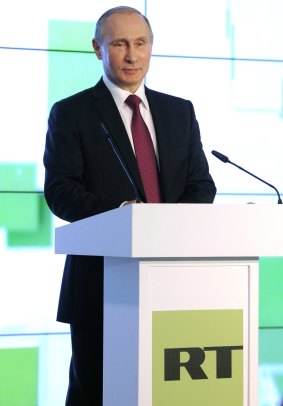 Russian President Vladimir Putin speaks in December, 2015 at an exhibition marking the 10th anniversary of RT.