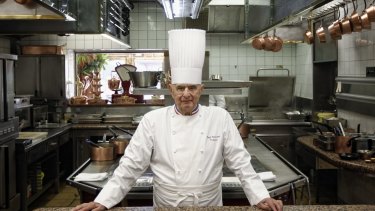 French Chef Paul Bocuse in 2011 at his famed Michelin three-star restaurant L'Auberge du Pont de Collonges in Collonges-au-Mont-d'or, central France. 