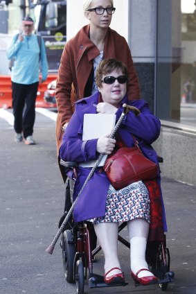 Lindt Cafe siege survivor Louisa Hope (sitting in wheelchair) arrives at the inquest last week.