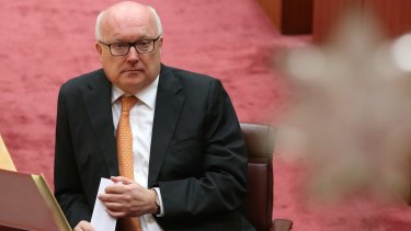 Attorney-General George Brandis argues civil celebrants should be granted the right to discriminate.