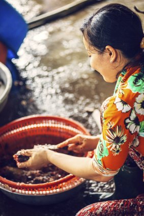 A street market seller in Vietnam.