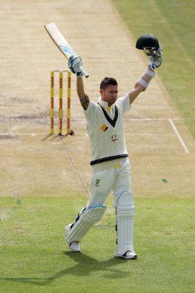 Australian captain Michael Clarke celebrates scoring a century against South Africa.