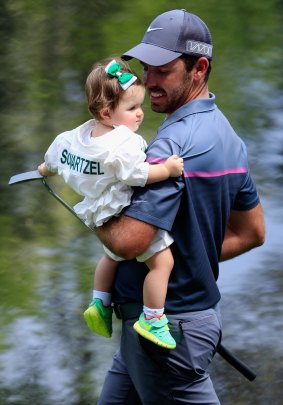 Charl Schwartzel of South Africa with his daughter.