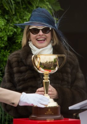Gai Waterhouse with the 18-carat Melbourne Cup.