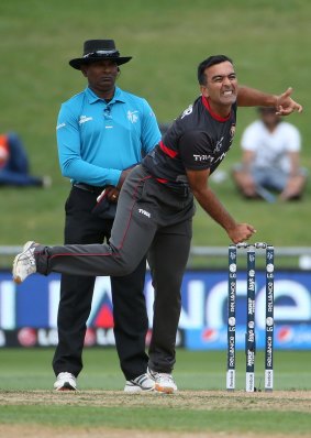 UAE captain Mohamed Tauqir gives it a twirl against the West Indies on Sunday.