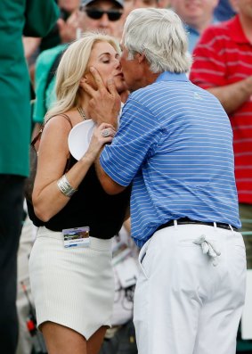Crenshaw kisses his wife Julie.