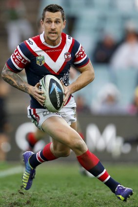 On the run: Mitchell Pearce will be a key player for the Roosters against Gold Coast.