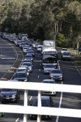 Traffic chaos: Bushfires burning in the lower Blue Mountains forced road closures. 