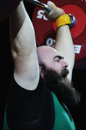 No gold: Damon Kelly took bronze in weightlifting. 