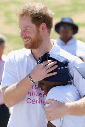 Prince Harry honours his mother's commitment to charity work.