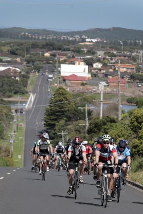 Riders make their way up the Hopkins Point Road Hill, as they head towards Port Campbell, on day four of the Great Victorian Bike Ride.