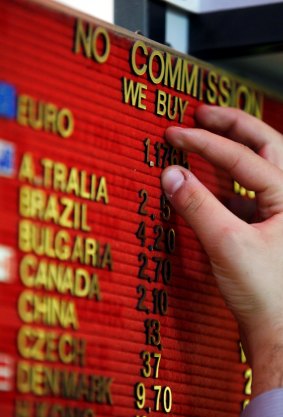 Ups and downs: John Abernethy expects the Aussie to fall by less against the euro than the US dollar.