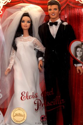 Elvis and Priscilla Barbie dolls are displayed for sale at Graceland.
